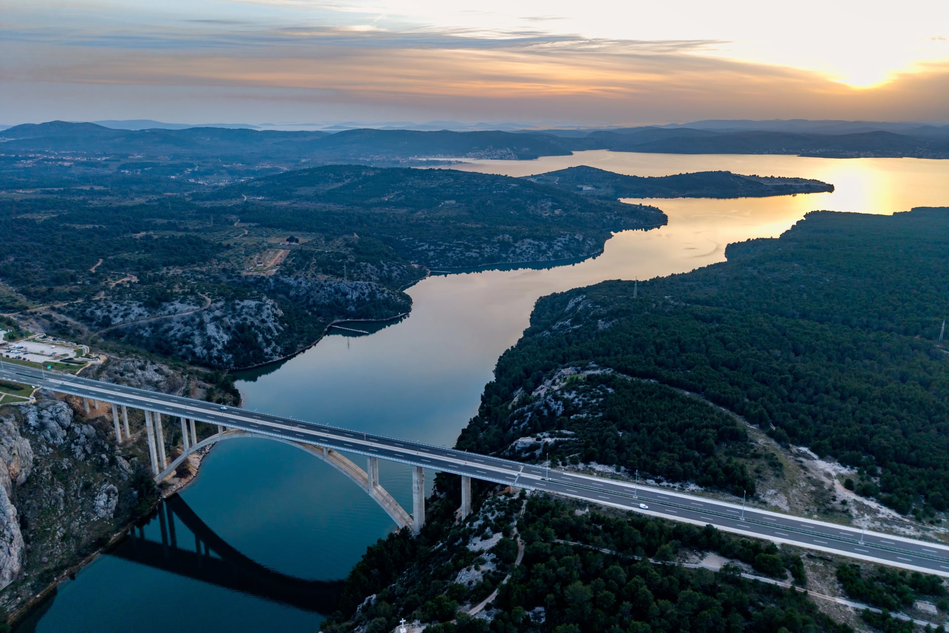 Aerial panoramic view of bridge over Krka River near Skradin town, Croatia